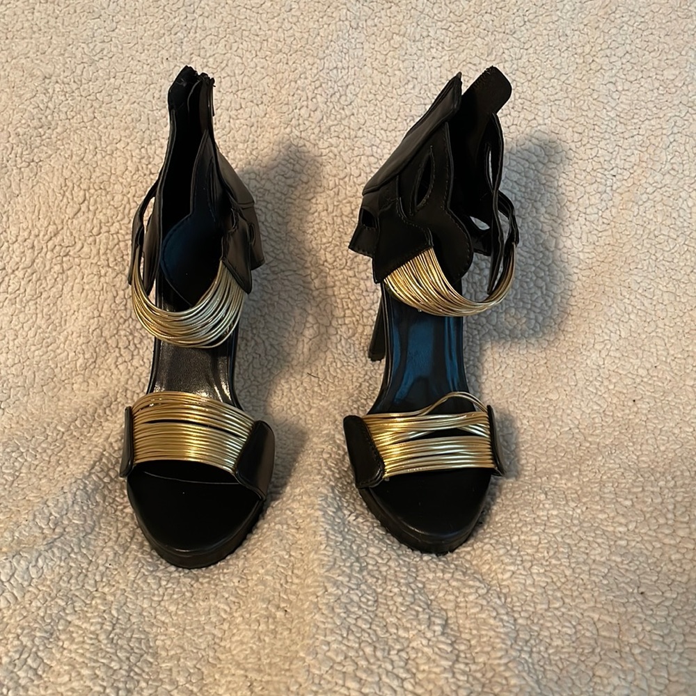 Black and gold heels